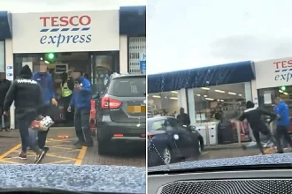 A suspected shoplifter was filmed punching a staff member and a bystander in a Tesco car park in Leeds after a basket full of stolen goods was spilled during a confrontation.