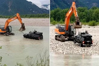 Two tourists and their dogs had to be rescued by helicopter and river teams after driving their pickup truck into a fast-flowing Italian river - and getting stranded in the middle.