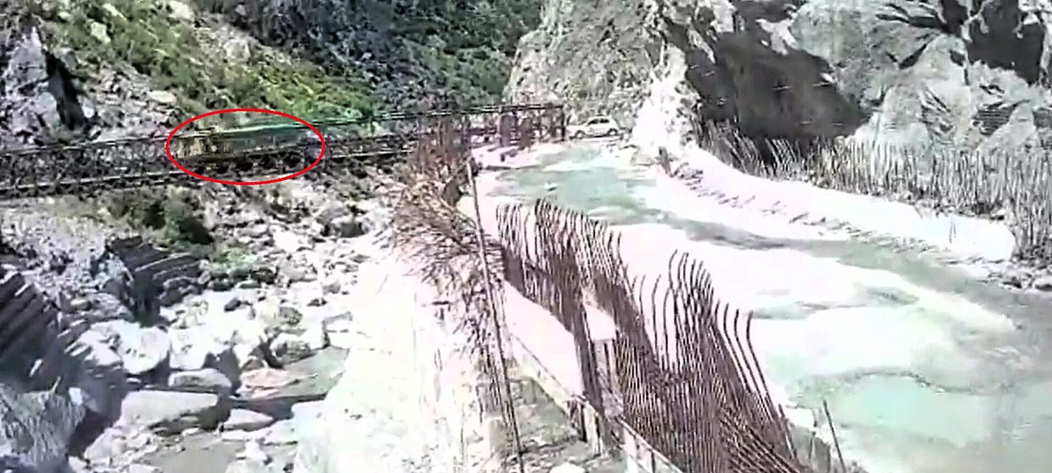 A lorry driver miraculously survived with minor injuries after the bridge he was crossing collapsed and sent him plunging 30 feet into a rocky riverbed in India.
