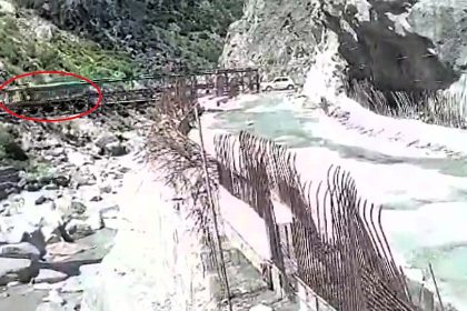 A lorry driver miraculously survived with minor injuries after the bridge he was crossing collapsed and sent him plunging 30 feet into a rocky riverbed in India.