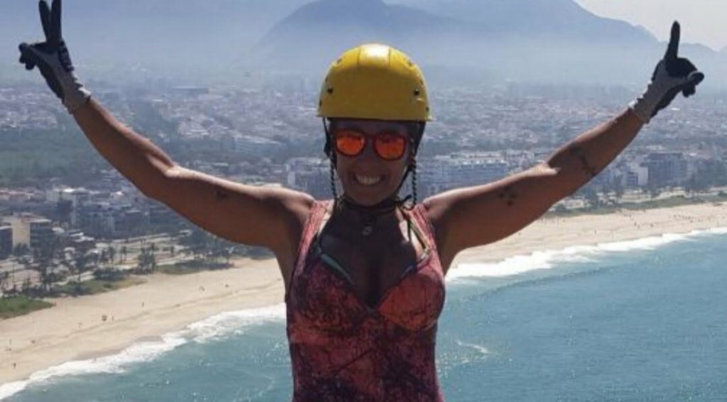 A woman fell 30 metres to her death on a cliffside hike in Brazil after losing her balance while lifting her leg to apply insect repellent - the guide tried to grab her but nearly fell too.