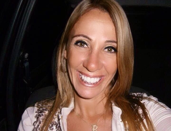 A woman fell 30 metres to her death on a cliffside hike in Brazil after losing her balance while lifting her leg to apply insect repellent - the guide tried to grab her but nearly fell too.
