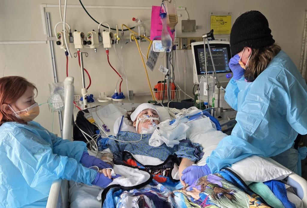 A 12-year-old boy has been left paralysed from the neck down after being shot four times during a sleepover - his heartbroken mum calls it the biggest regret of her life.