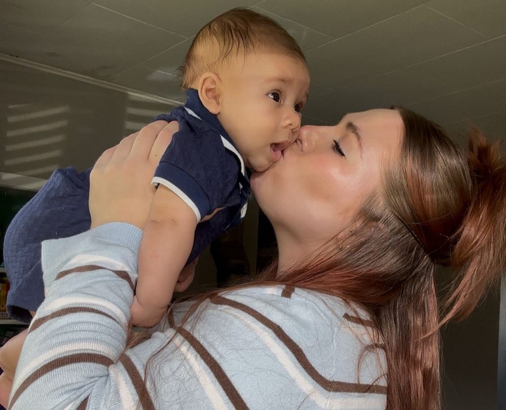 A mum reveals the shocking moment her uterus fell out while she held her newborn - her doctor looked like a 'deer in headlights' as a rare complication almost killed her.