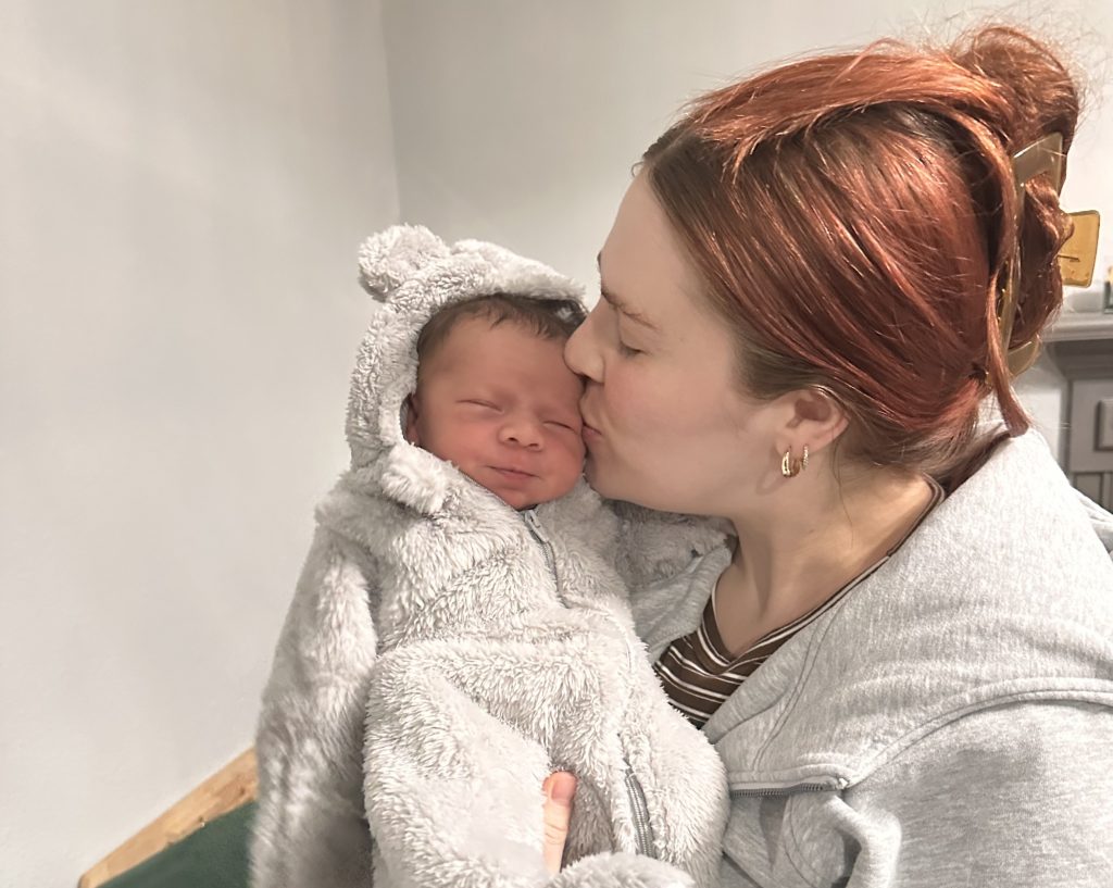 A mum reveals the shocking moment her uterus fell out while she held her newborn - her doctor looked like a 'deer in headlights' as a rare complication almost killed her.