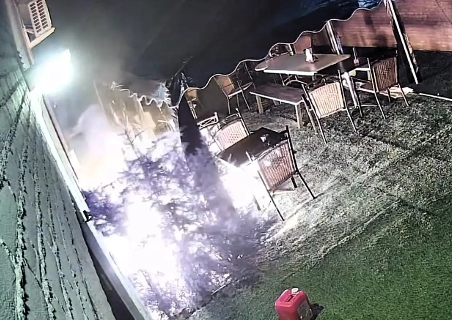 An arsonist accidentally set himself alight while hurling a firebomb at a Dutch cafe - and fled on foot with his clothes still burning.