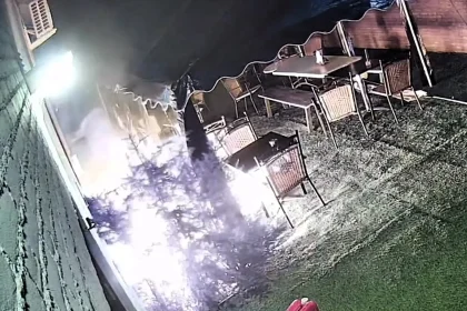 An arsonist accidentally set himself alight while hurling a firebomb at a Dutch cafe - and fled on foot with his clothes still burning.