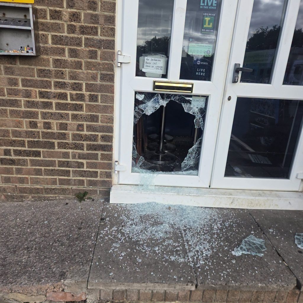 Devastated bar owners hit out at 'scumbag' thieves who smashed their way into their Devon venue in a late night raid, stealing cash and even a charity collection tin.