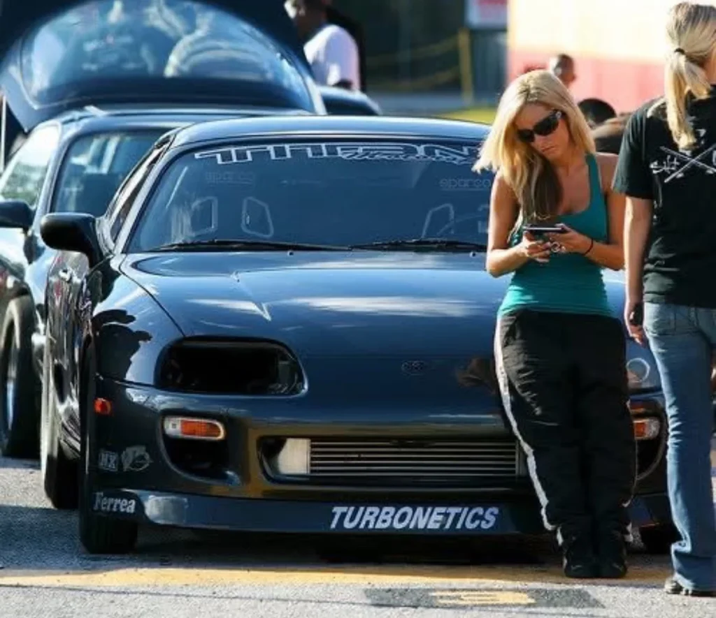 Former bikini model reveals she'd win beauty titles then jump into her 1,000HP Toyota Supra to beat the boys drag racing at America's biggest car meets.