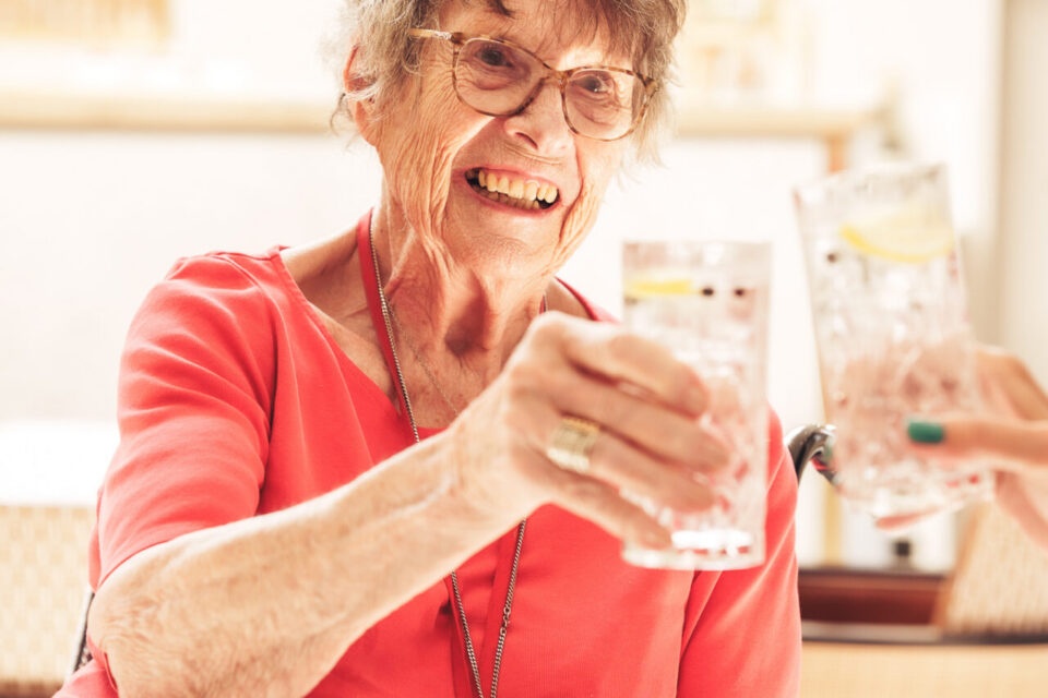 Boozy care home residents create an award-winning London dry gin, beating 154 rivals worldwide to scoop the top medal at the Global Gin Masters.