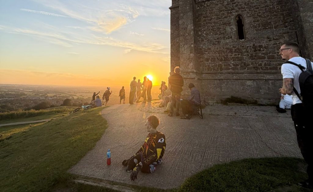 Double amputee rapper Kray-Z Legz, who survived sepsis, crawls up Glastonbury Tor on his hands and knees to raise money for disabled musicians.