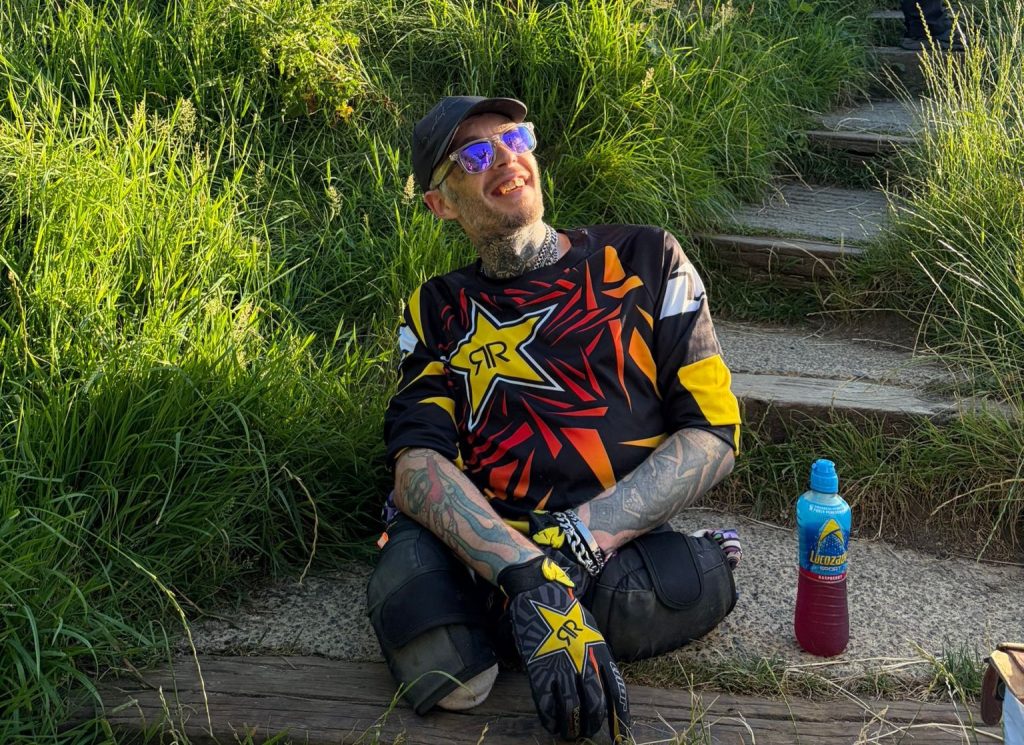 Double amputee rapper Kray-Z Legz, who survived sepsis, crawls up Glastonbury Tor on his hands and knees to raise money for disabled musicians.