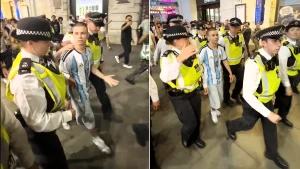 A lone Argentina fan was mobbed by furious England supporters in Piccadilly Circus after the Three Lions crashed out of the World Cup semi-final.