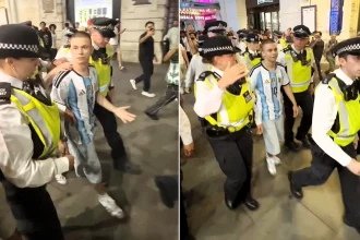 A lone Argentina fan was mobbed by furious England supporters in Piccadilly Circus after the Three Lions crashed out of the World Cup semi-final.