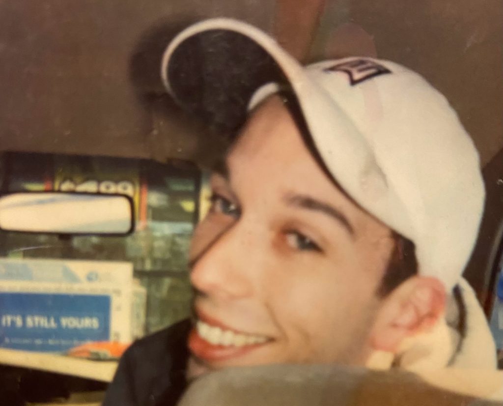 Woman accused of murder is on the run after the remains of a missing man are found in a shallow grave, with police warning she may have changed her appearance.