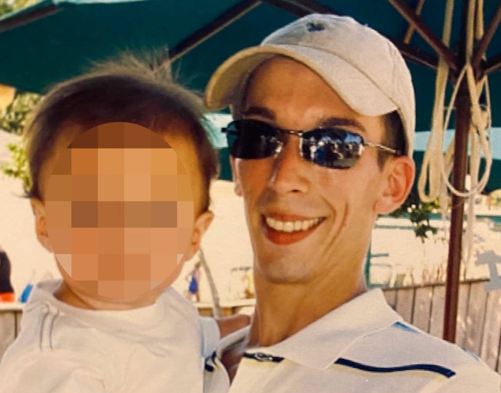 Woman accused of murder is on the run after the remains of a missing man are found in a shallow grave, with police warning she may have changed her appearance.