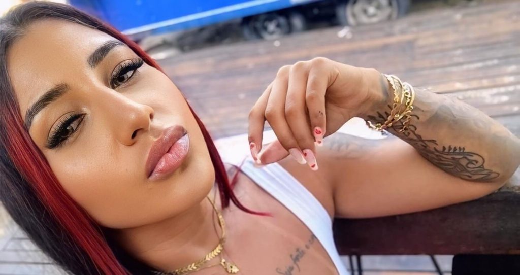 A fitness influencer has died after a "jealous pal" grabbed the steering wheel during a row, sending their car plunging into a flooded construction shaft in Brazil.