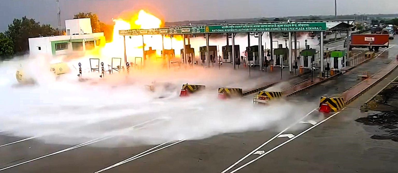 Five people were killed and several injured when an LPG tanker exploded after crashing into a toll booth at speed in India - with the blaze visible from 2km away.