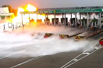 Five people were killed and several injured when an LPG tanker exploded after crashing into a toll booth at speed in India - with the blaze visible from 2km away.
