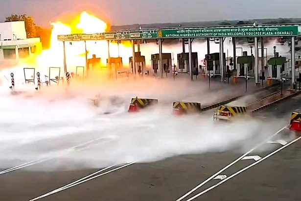 Five people were killed and several injured when an LPG tanker exploded after crashing into a toll booth at speed in India - with the blaze visible from 2km away.