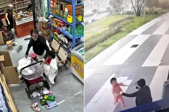 A six-year-old girl was blown out of a shop doorway while still in her bed during powerful typhoon winds in China - CCTV shows her swept across the tarmac onto grass.