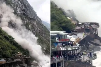 A huge landslide has crashed down near a viewing platform crammed with tourists - with hundreds scrambling for their lives as boulders smashed into the river.