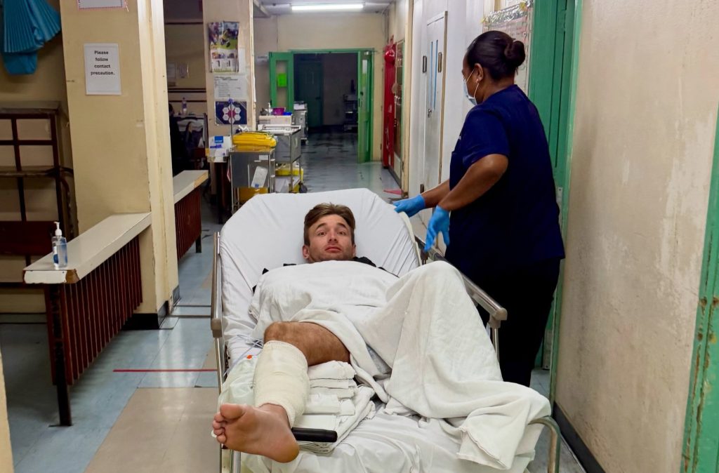 Fishing influencer left needing four surgeries and a skin graft after a grey reef shark attack in Fiji almost cost him his leg - but he has 'no hard feelings' towards the predator.