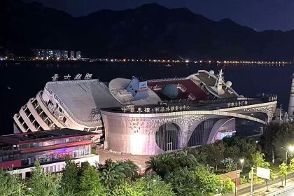A £22m luxury cruise ship toppled over at its dock in China as Typhoon Bavi whipped up spring tides - the vessel had sat idle for 14 years.