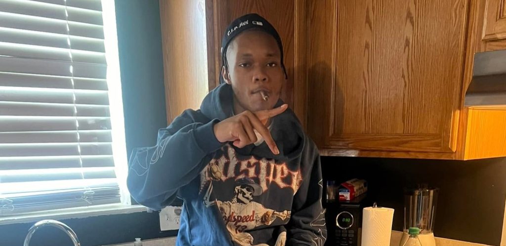 Man, 20, named as KeShawn Emery after being shot dead in a Michigan shopping centre food court, as terrified shoppers fled and a woman was also wounded in the chaos.