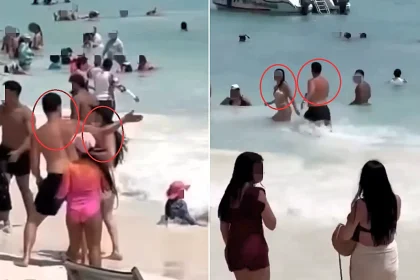 Man allegedly attacks his partner and a mistaken bystander on a packed Dominican Republic beach, before onlookers drag him into the sea and beat him.