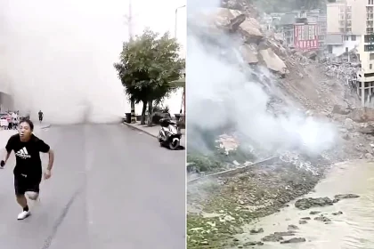Dramatic footage captured the terrifying moment a landslide flattened residential buildings in Pengshui County, China, with people feared trapped under the debris.