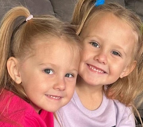 A driver accused of killing a mother and three of her children by running a red light has handed himself in almost three months on, after being indicted in Alabama.