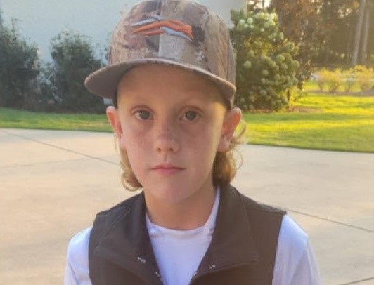 A driver accused of killing a mother and three of her children by running a red light has handed himself in almost three months on, after being indicted in Alabama.