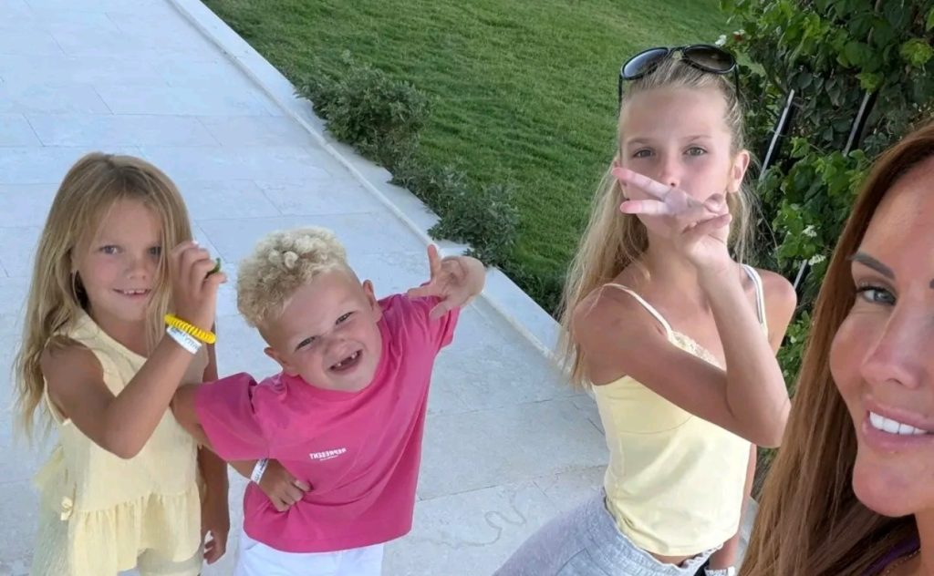 A mum has told how she grabbed her children from their beds and fled down a flooded hotel staircase as a fire broke out - with allegedly no alarm sounding.