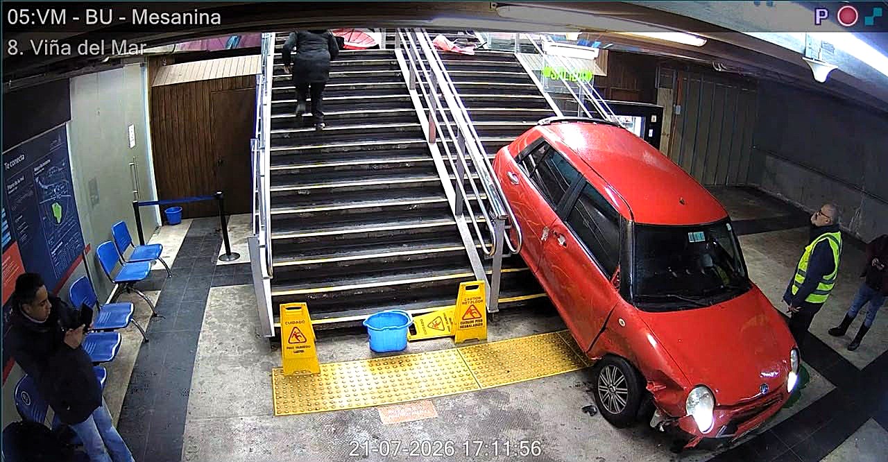 A car smashed through railings and down the steps of a train station in Chile after a two-car crash - killing a nursing assistant and injuring five others.