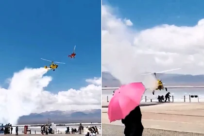A sightseeing gyroplane spun out of control and crash-landed on two tourists at a Chinese scenic spot, leaving both with head injuries - one seriously hurt.