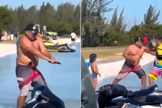 Off-duty Brazil cop pulls gun on kitesurfer at packed beach and pulls trigger twice in shock video as police launch investigation into terrifying encounter