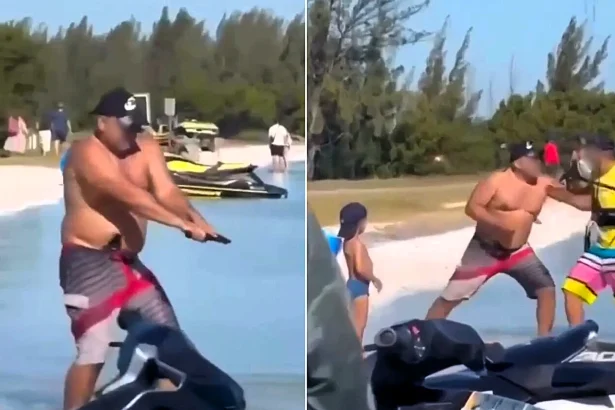 Off-duty Brazil cop pulls gun on kitesurfer at packed beach and pulls trigger twice in shock video as police launch investigation into terrifying encounter