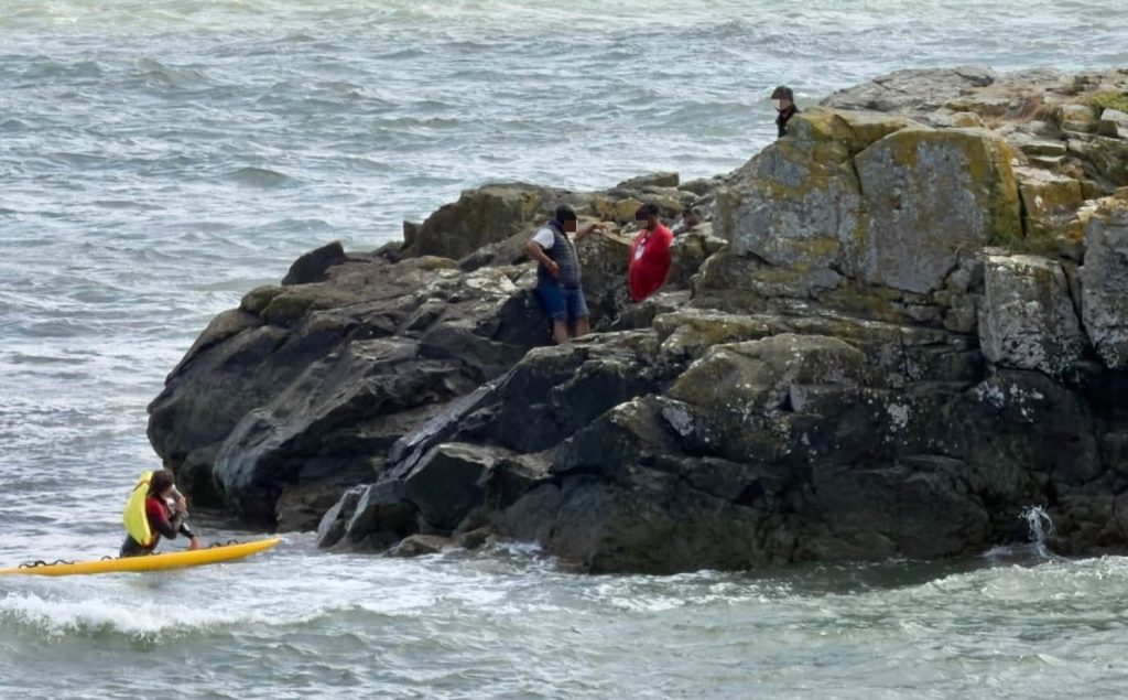 Five Bank Holiday tourists had to be winched to safety by helicopter after ignoring the incoming tide at Cornwall's Chapel Rock - branded "completely reckless" by a witness.