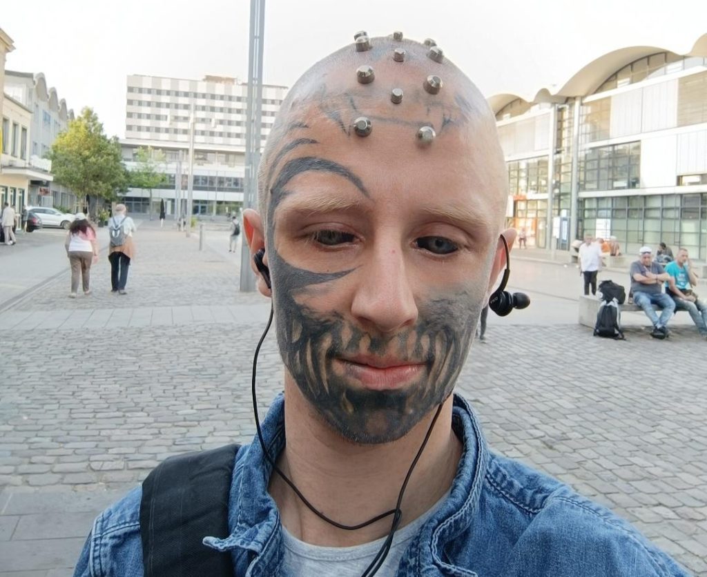 Blind man with tattooed black eyeballs is constantly accused of blinding himself - but a rare genetic condition stole his sight years before the extreme body modification.