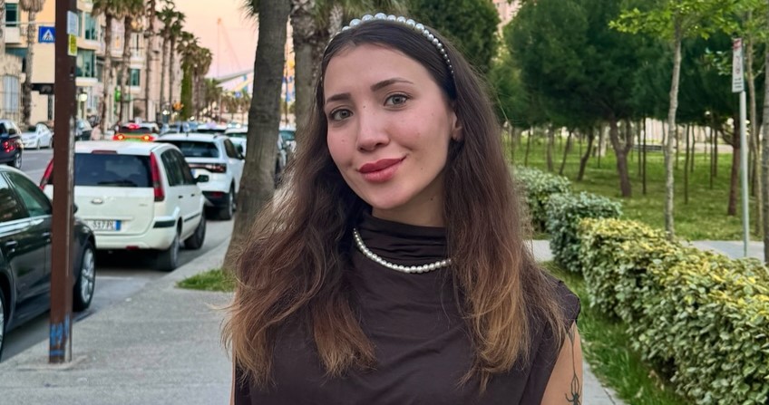 A motorcyclist was left distraught after her pet cat escaped from her backpack on a busy highway - coming within inches of being hit by a lorry.