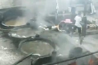 A worker died after falling into a vat of boiling sugar at a factory - CCTV shows him becoming dizzy and losing his balance moments before the fall.