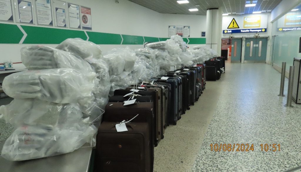 A drug mule mum has been convicted after helping smuggle £13m of cannabis into the UK in 22 suitcases - with the gang paying excess baggage fees to get them home.