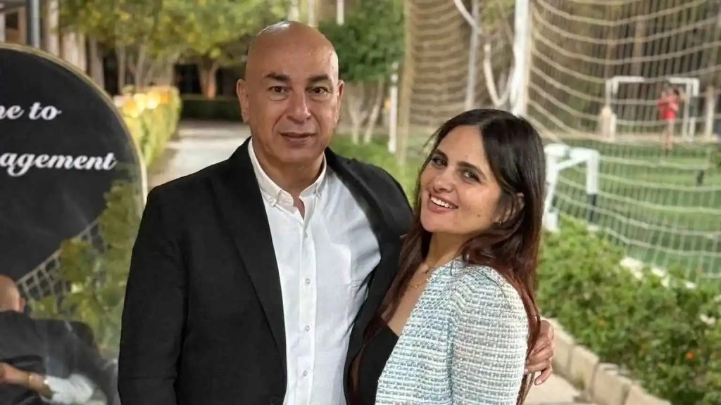Egypt football boss Hossam Hassan reportedly fainted as his "two wives" brawled at a hotel café - with hot coffee allegedly thrown in the row.
