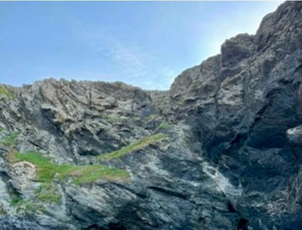 A cave made famous by the BBC's Poldark has been destroyed in a Cornwall cliff fall - with thousands of tonnes of rock burying the ancient holy well pilgrims flocked to.