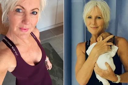 A fashion boss branded an inappropriate granny for refusing to cover up has welcomed her first grandchild - but says she won't be swapping corsets for cardigans.