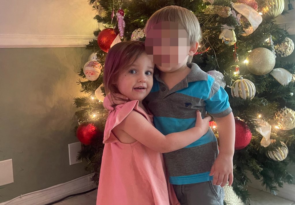 Briella Holmes, three, died from probable positional asphyxia after becoming wedged inside a wooden toy oven at her babysitter's home while trying to retrieve fallen toys.