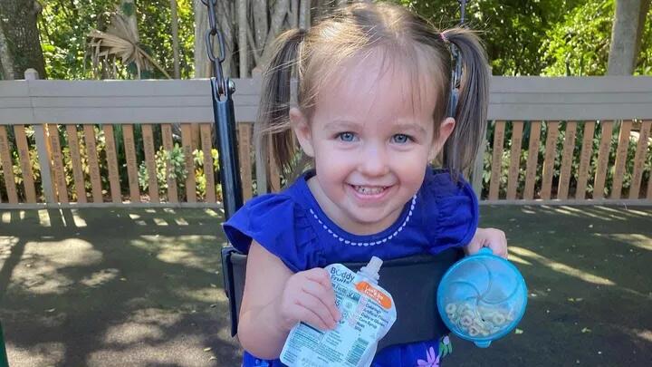 Briella Holmes, three, died from probable positional asphyxia after becoming wedged inside a wooden toy oven at her babysitter's home while trying to retrieve fallen toys.