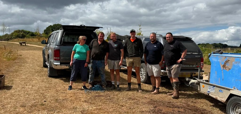 Heroic Brits have formed a human chain to save hundreds of fish from a rapidly drying Exeter pond, while slamming the local government for its lack of action.
