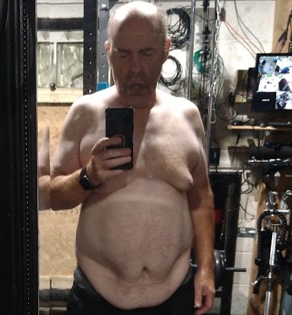 Man told he would be 'dead within months' loses 15 stone after ditching a bottle of vodka a day - he made a deal with God from his hospital bed.